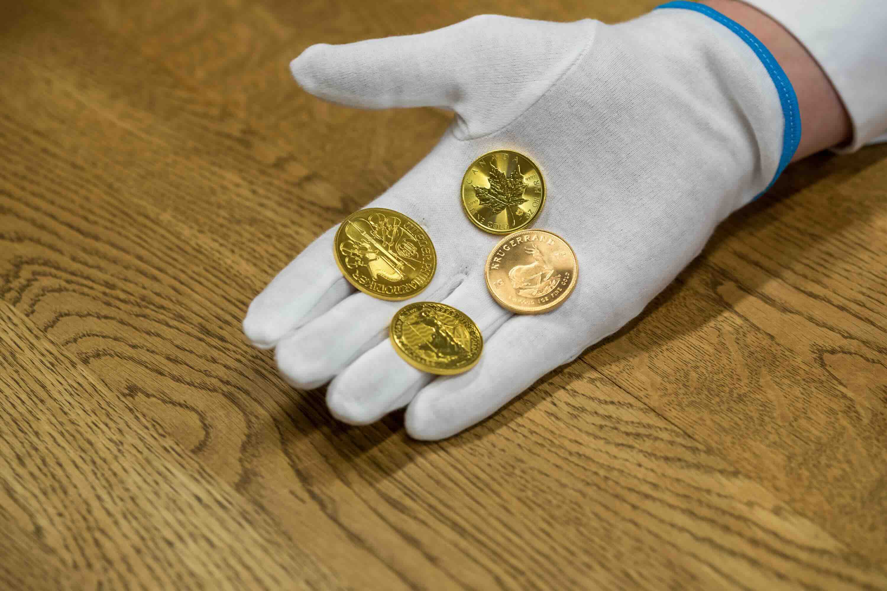 Hoe wordt de inkoopprijs van gouden munten bepaald?